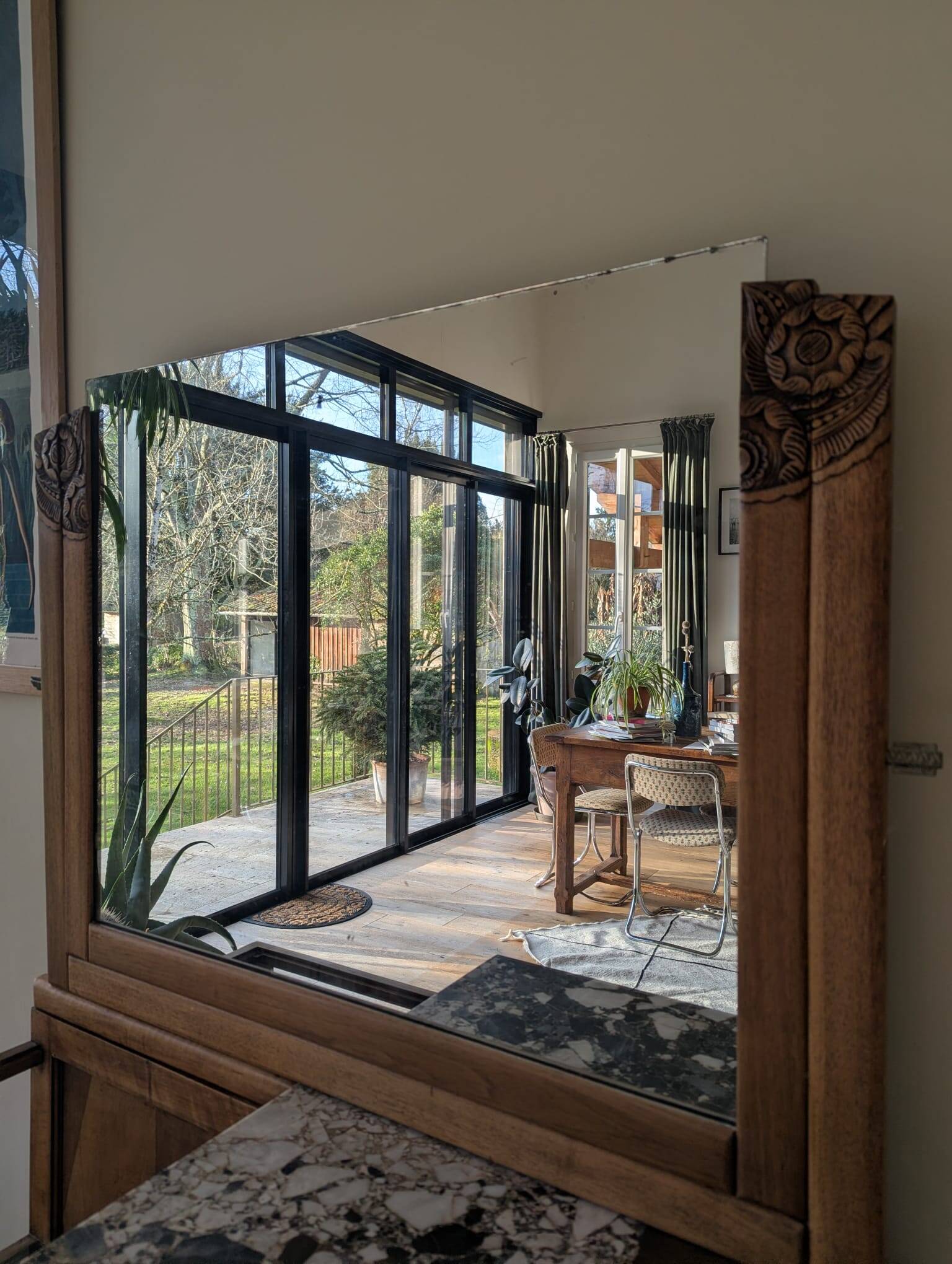 Art Deco wooden furniture with a swivelling mirror and marble top.