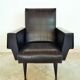 Black armchair of the 1950s