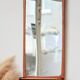 Teak mirror with shelf | Vintage 1960s Danish design