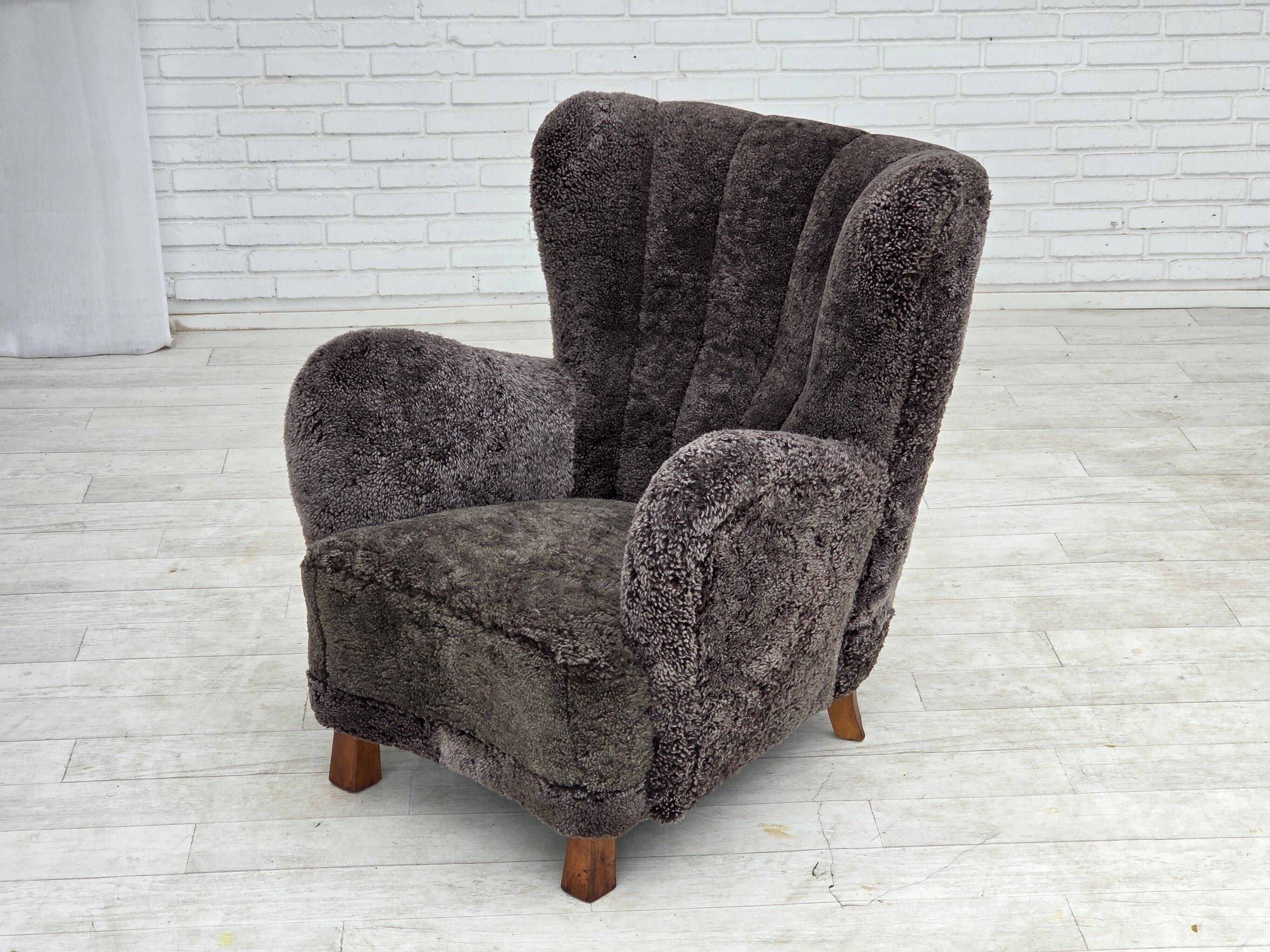 1960s, Danish design, reupholstered armchair, genuine sheepskin.