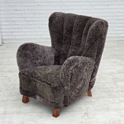 Années 1960, design danois, fauteuil rembourré, véritable peau de mouton.