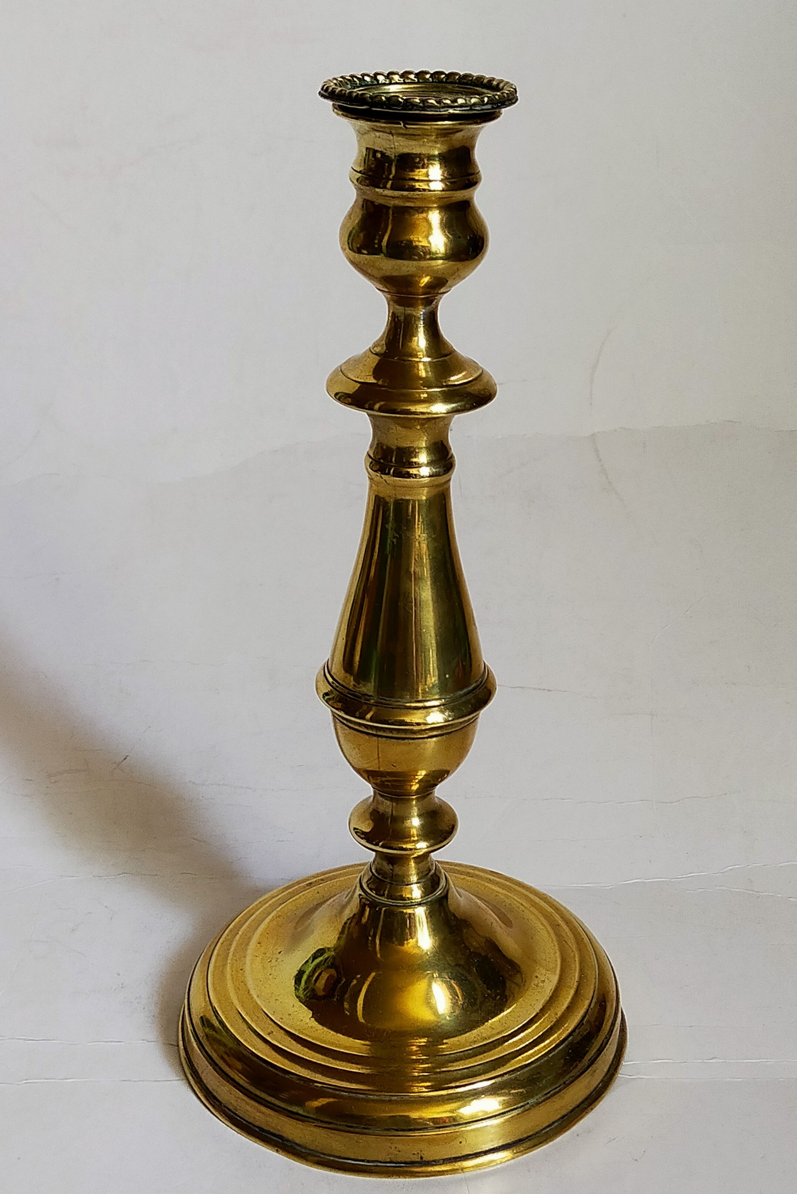 Old solid brass candle holder