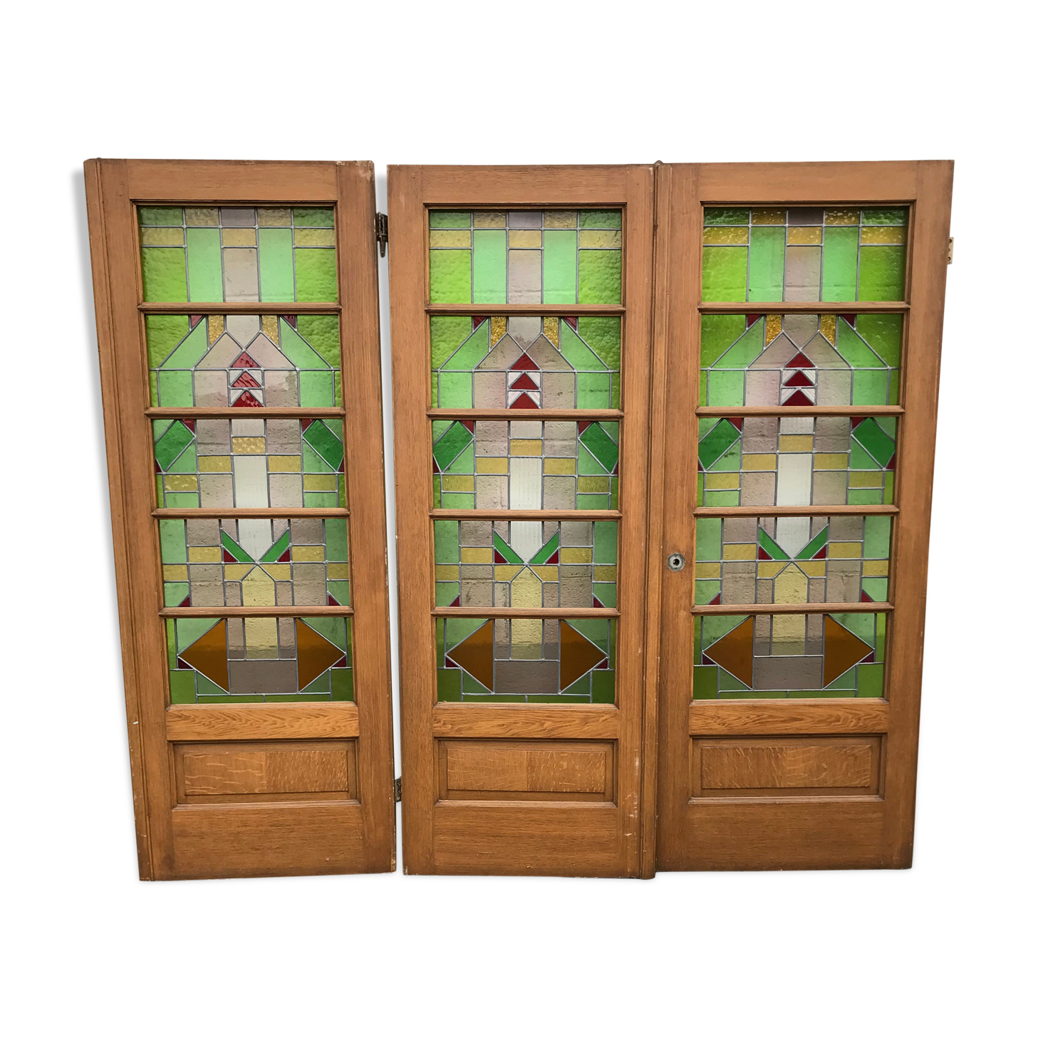 Series of three doors with stained glass windows