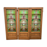 Series of three doors with stained glass windows