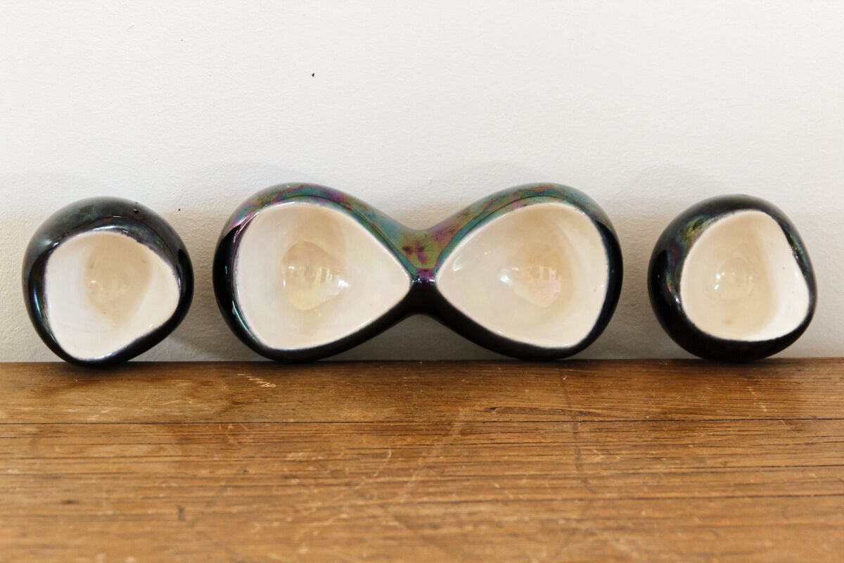 Lot of iridescent earthenware salerons