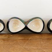 Lot of iridescent earthenware salerons