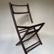 Set de quatre chaises pliantes en bois et cannage