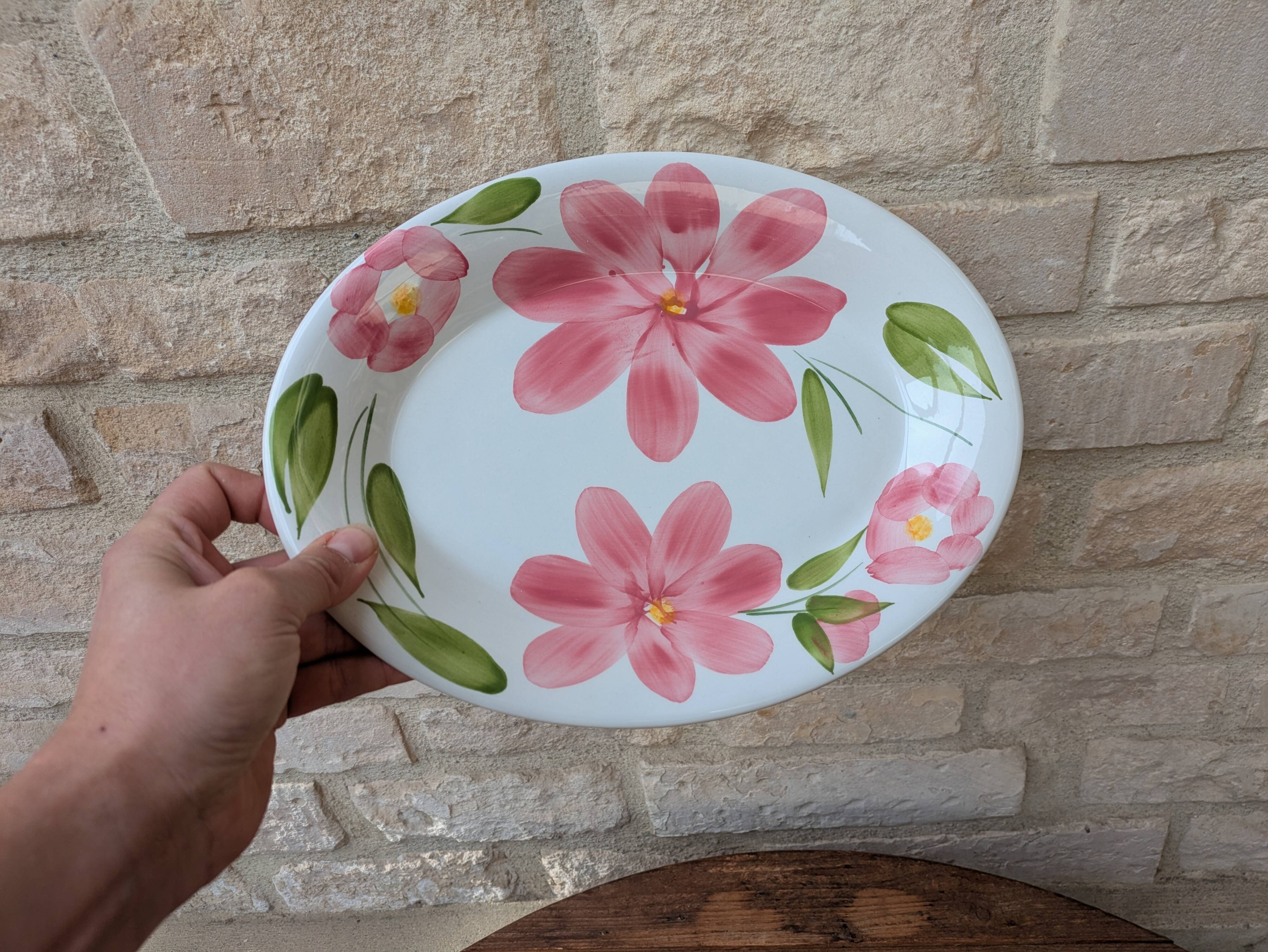 Oval serving dish with hand-painted pink flowers in San Marciano ceramic.