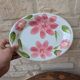 Oval serving dish with hand-painted pink flowers in San Marciano ceramic.