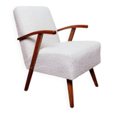 Vintage armchair in pearl white bouclé with walnut wood, 1960.