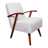Vintage armchair in pearl white bouclé with walnut wood, 1960.