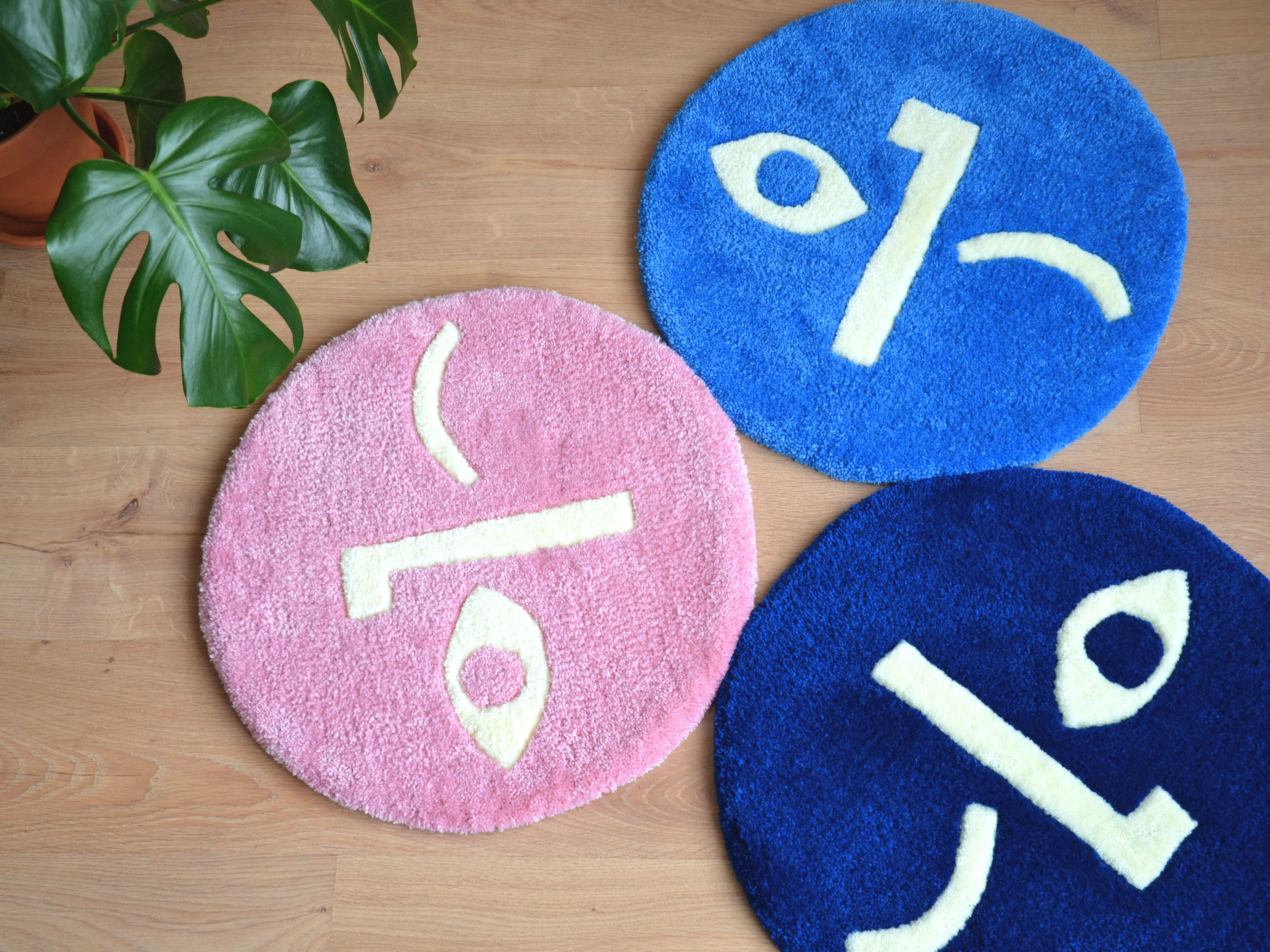 Tapis rond visage bleu roi 54x54cm