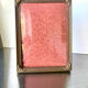 Metal frame in gold colored brass
