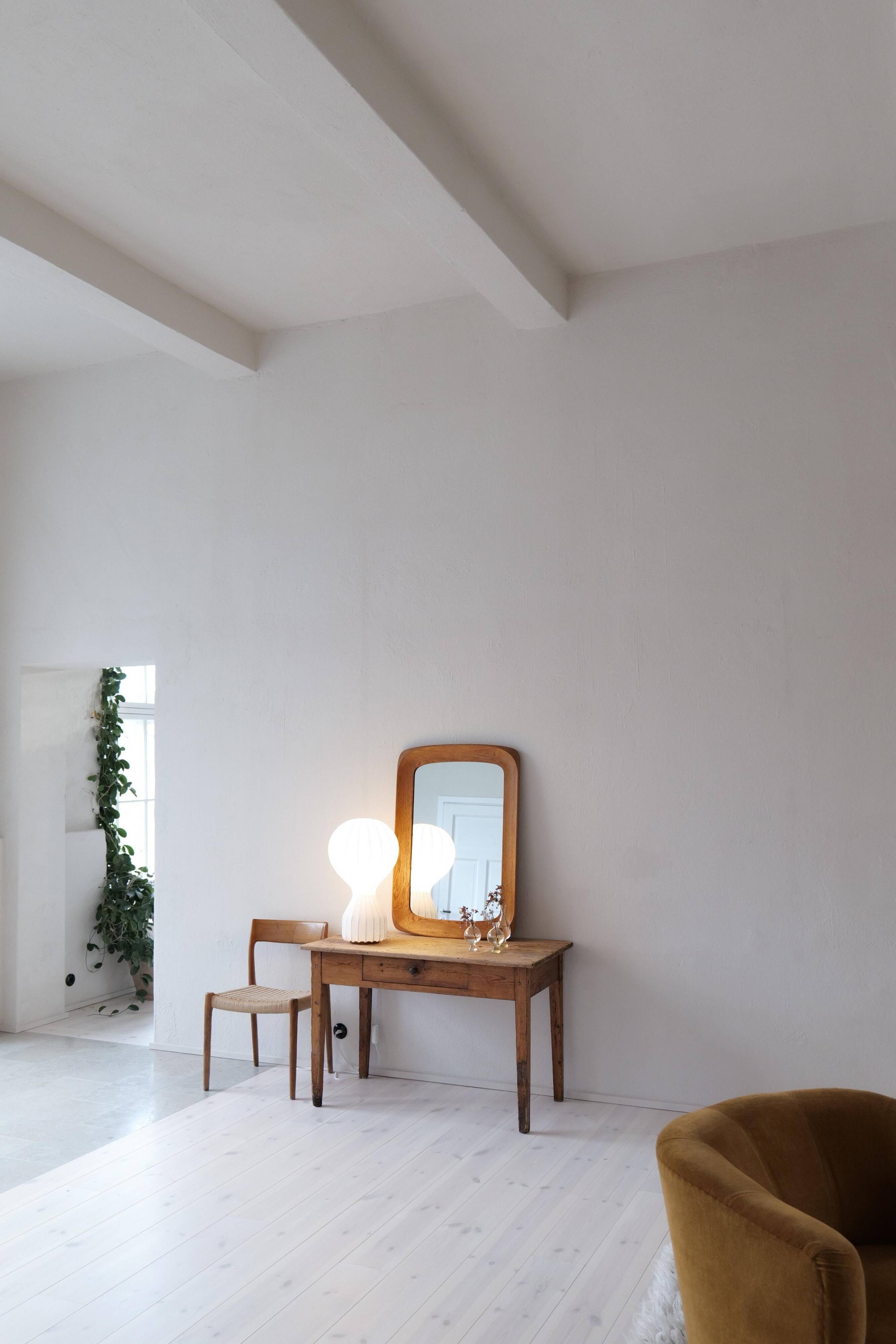 Mid-century modern sculptural wall mirror in stained oak, glass, Glas & Trä 1959