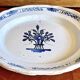 Old round hollow dish XVIII black bottom Rouen Forges les eaux