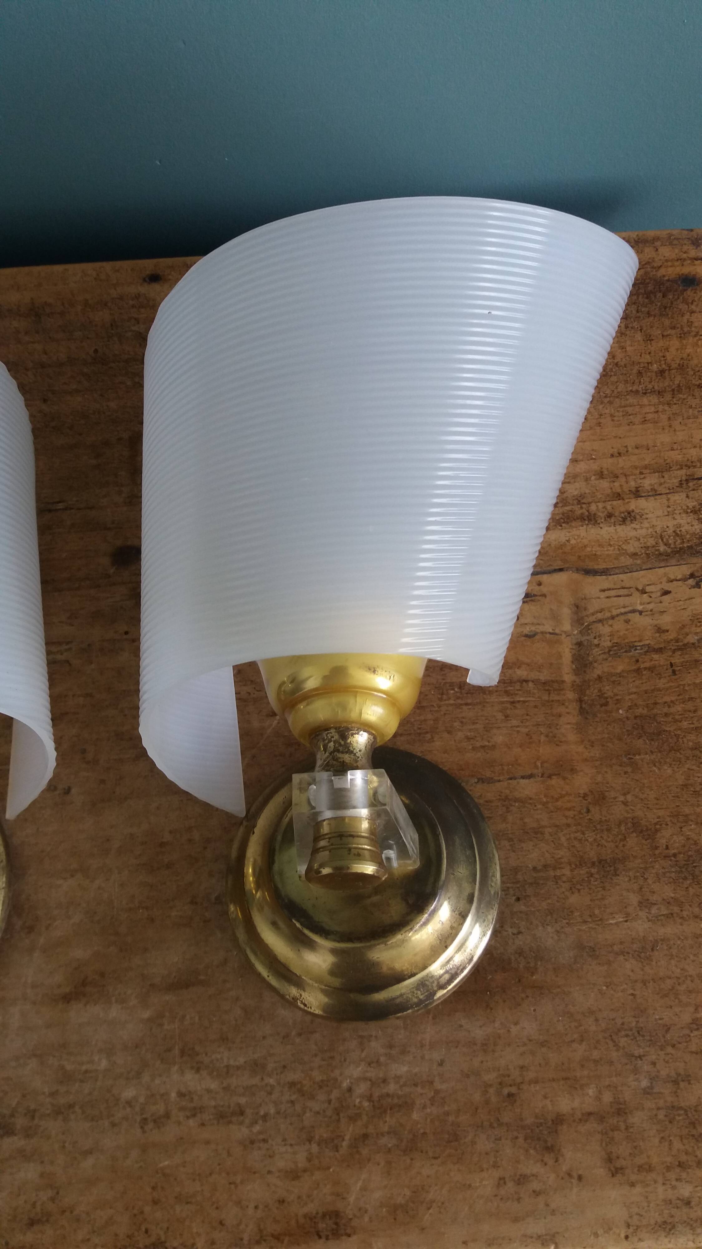 Golden metal appliques and plexiglass perspex in the style of Maison Lunel or Guariche.