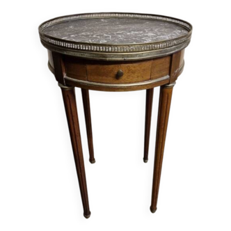 Louis XVI style bouillotte table in mahogany with a grey marble top.