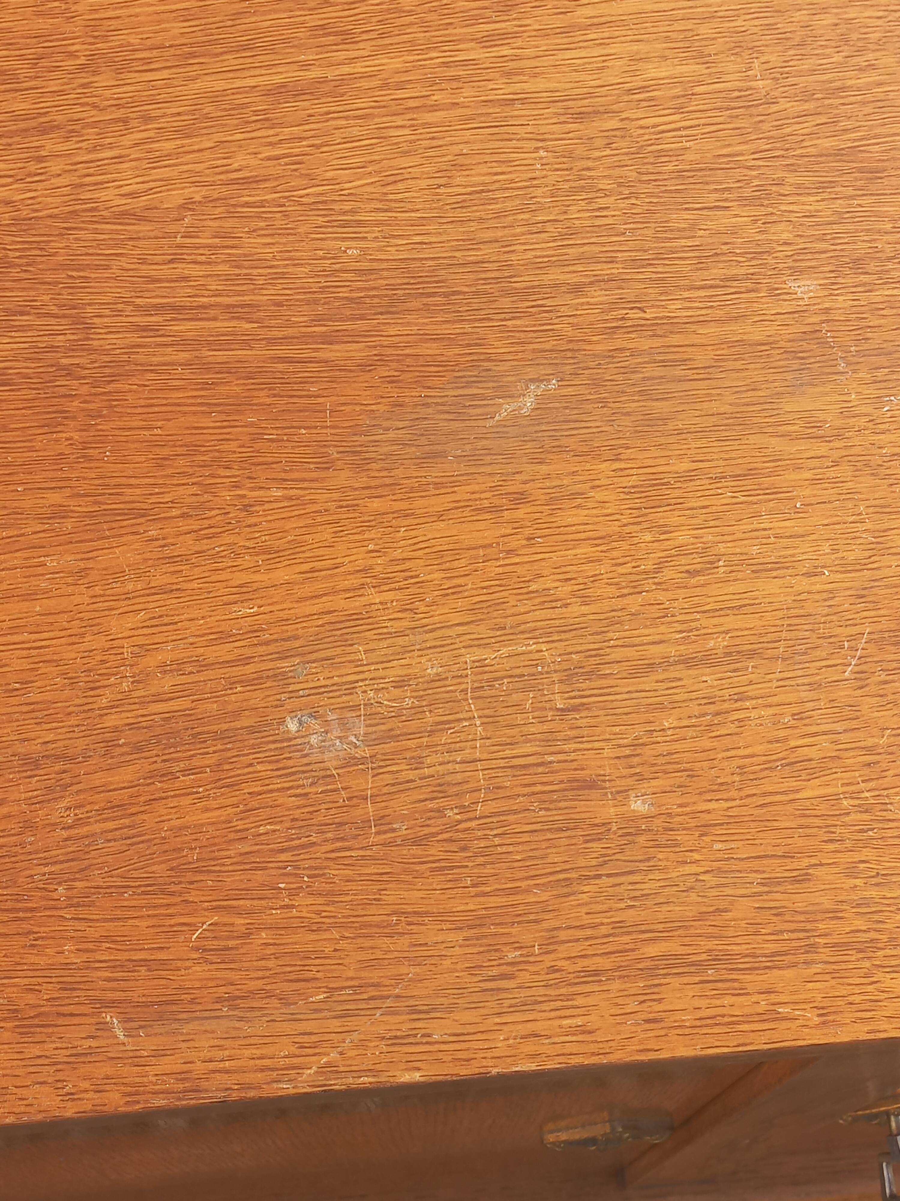 Vintage oak sideboard with splayed legs from the 1950s.