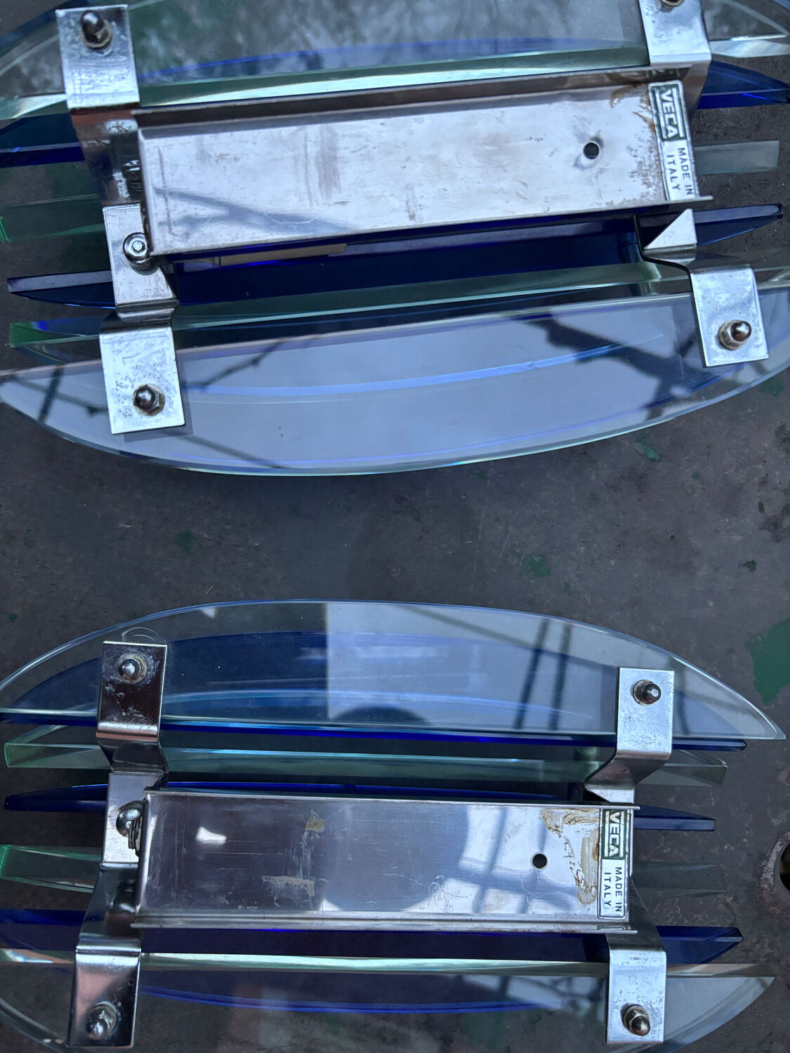 Two Veca Fontana Arte wall lights from 1970.