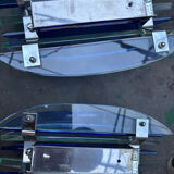 Two Veca Fontana Arte wall lights from 1970.