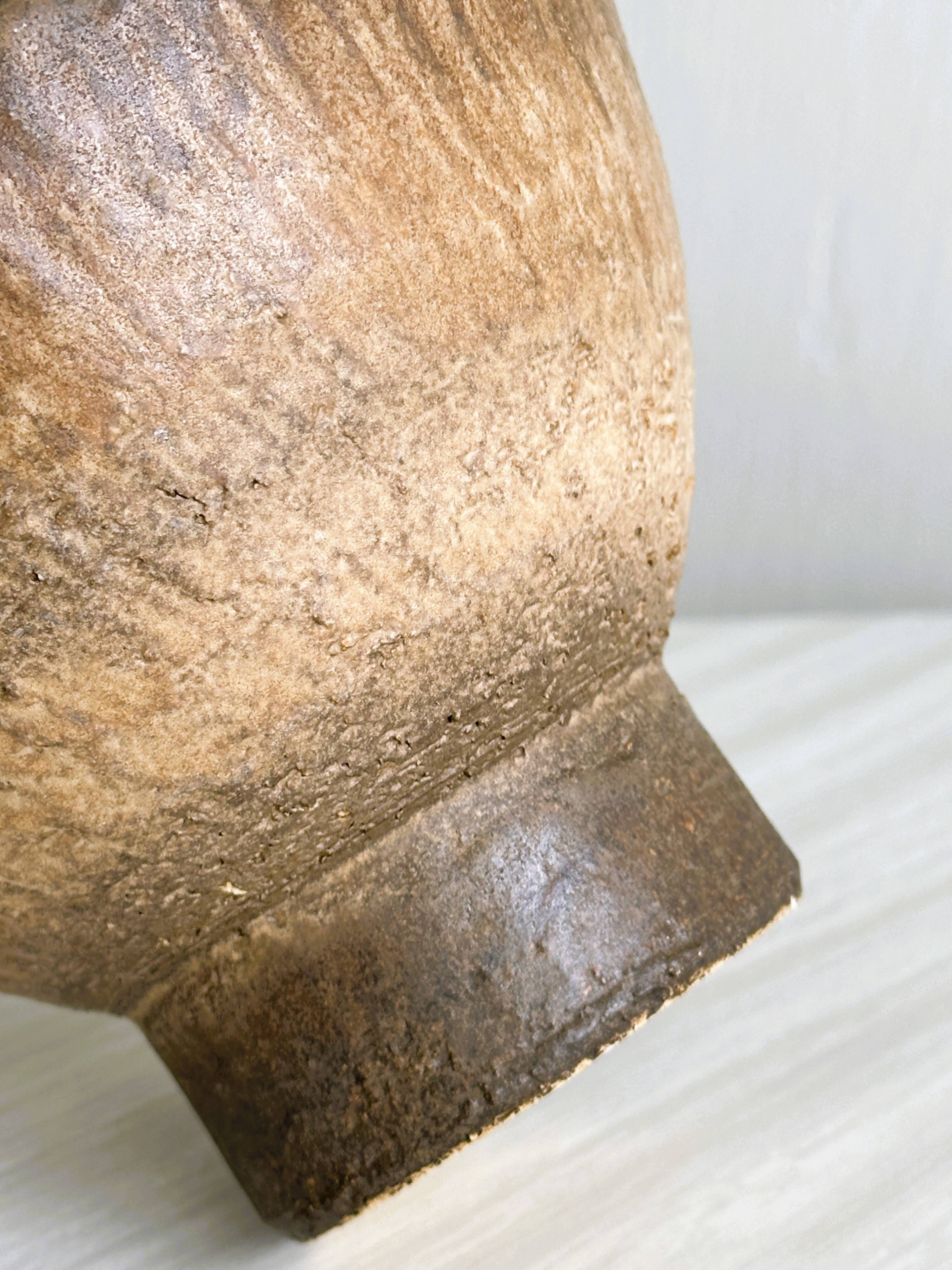 Small vintage cup in rustic glazed stoneware