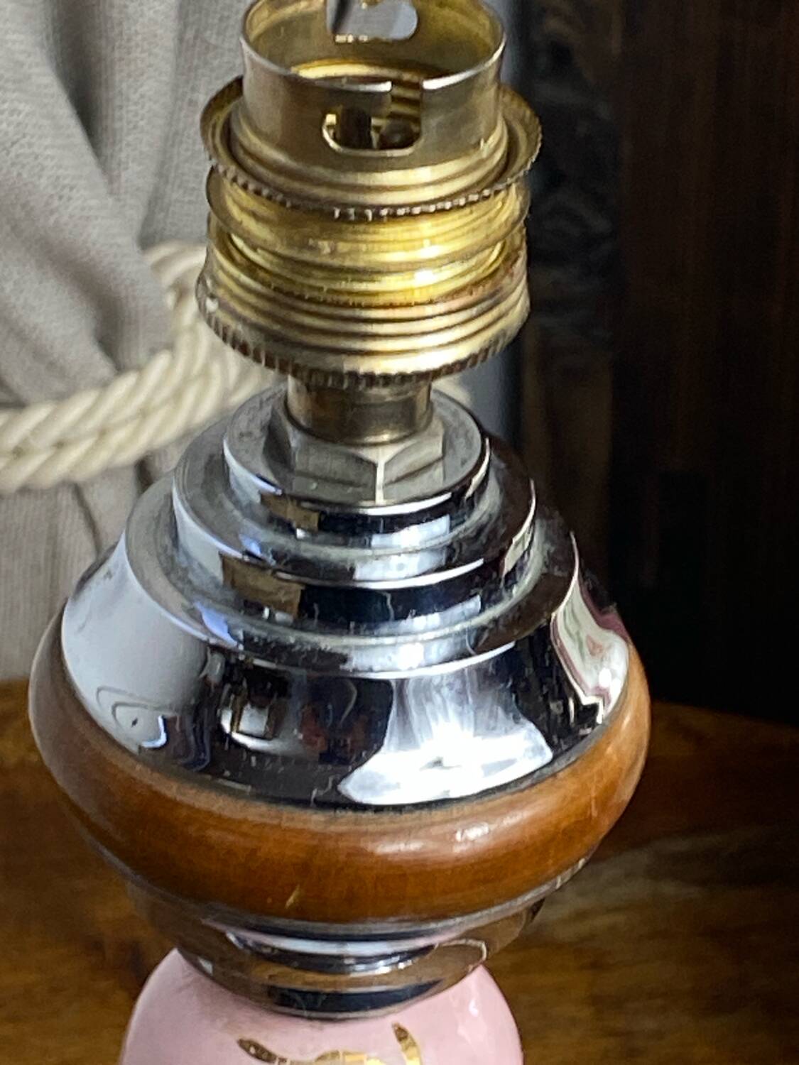 Lamp base in chrome metal, porcelain and wood.