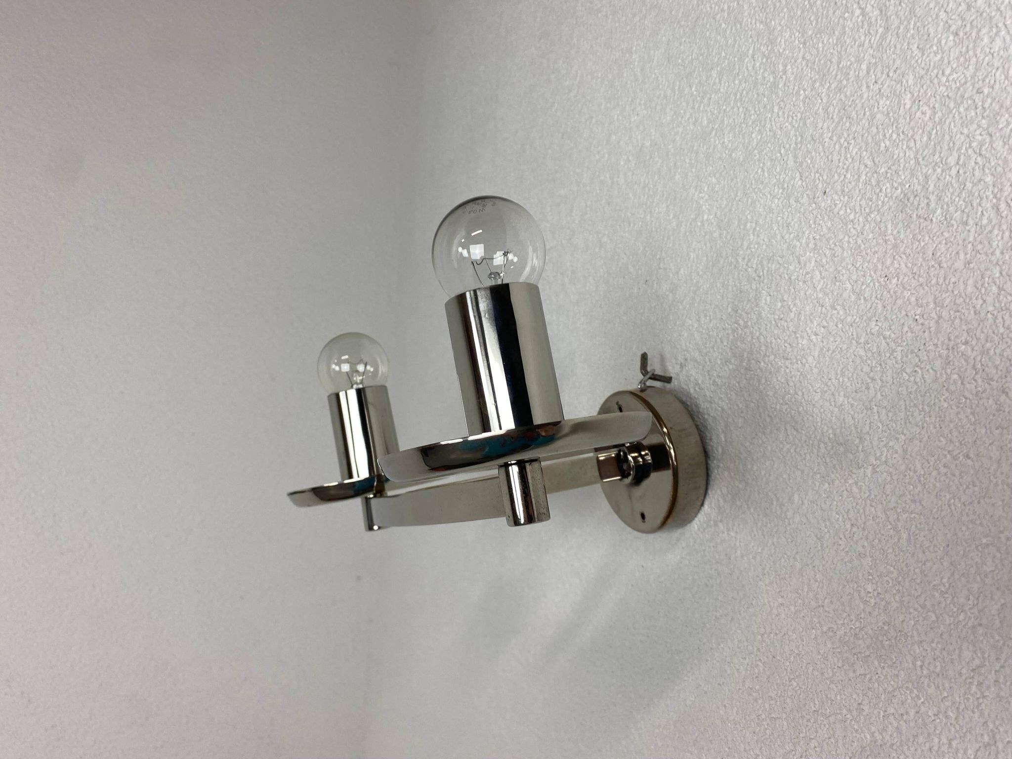 Large Bauhaus chandelier with two wall sconces.