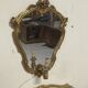 Pair of wall-mounted consoles with a mirror in Louis XV style.