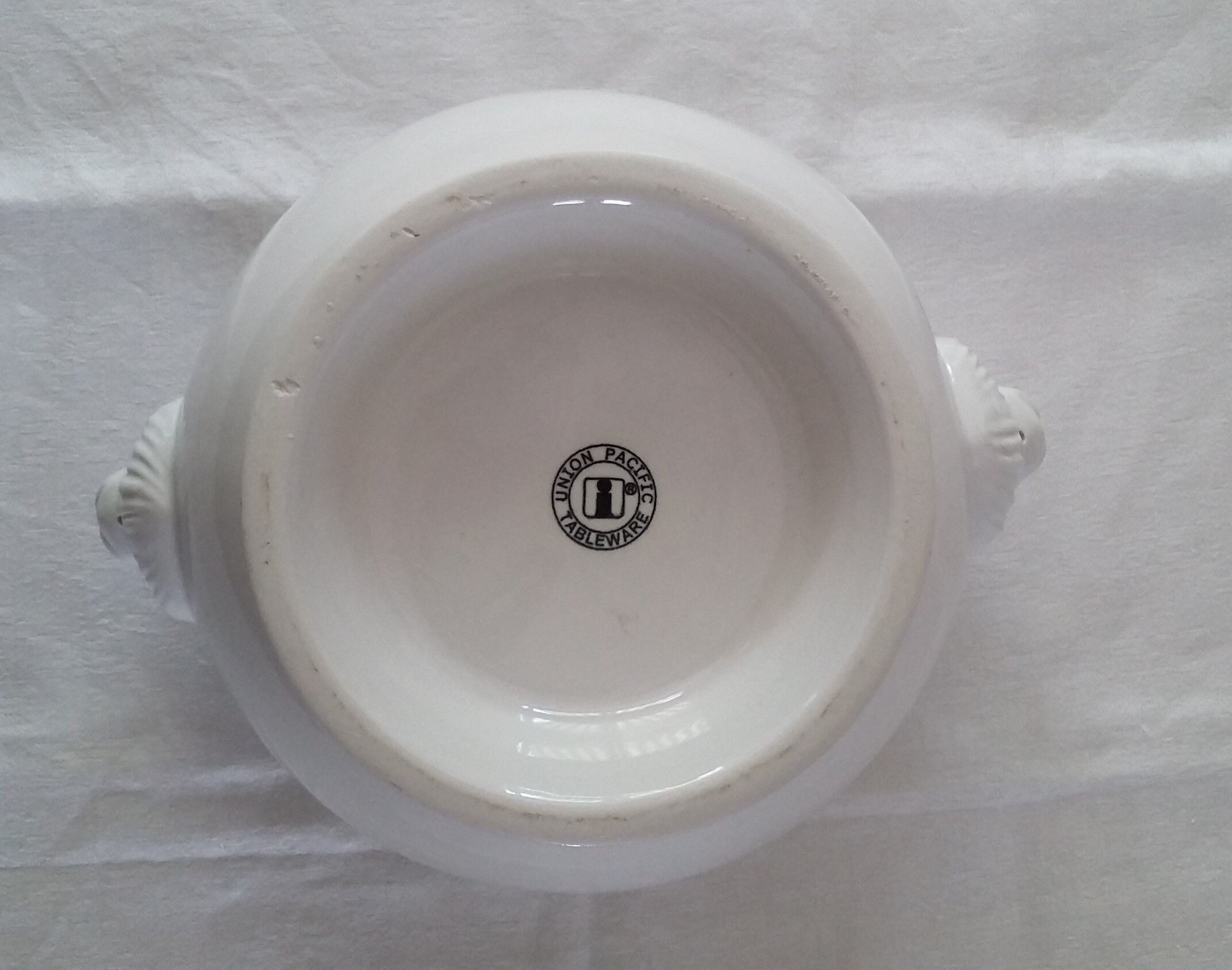 White porcelain soup with lions head