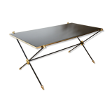 Black glass and brass coffee table in the 1960s