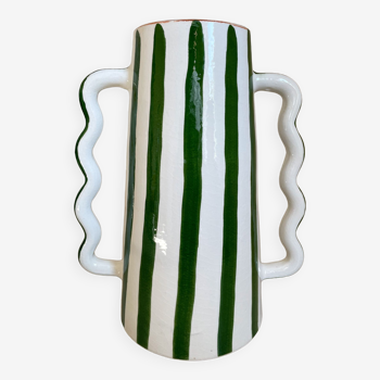 Green and white striped ceramic vase with abstract handmade corrugated handheld