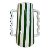 Green and white striped ceramic vase with abstract handmade corrugated handheld