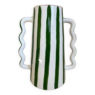 Green and white striped ceramic vase with abstract handmade corrugated handheld