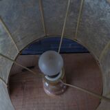 Lamp with base in polished beige-brown stones and its leather lampshade