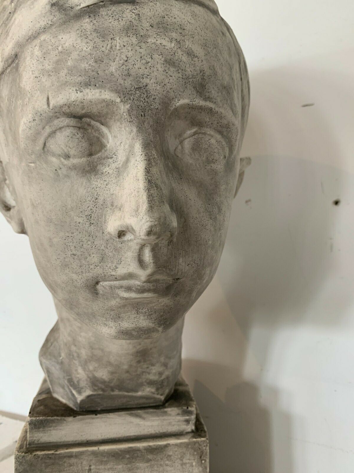 Bust of a young man in plaster signed Gerard Choain XX century