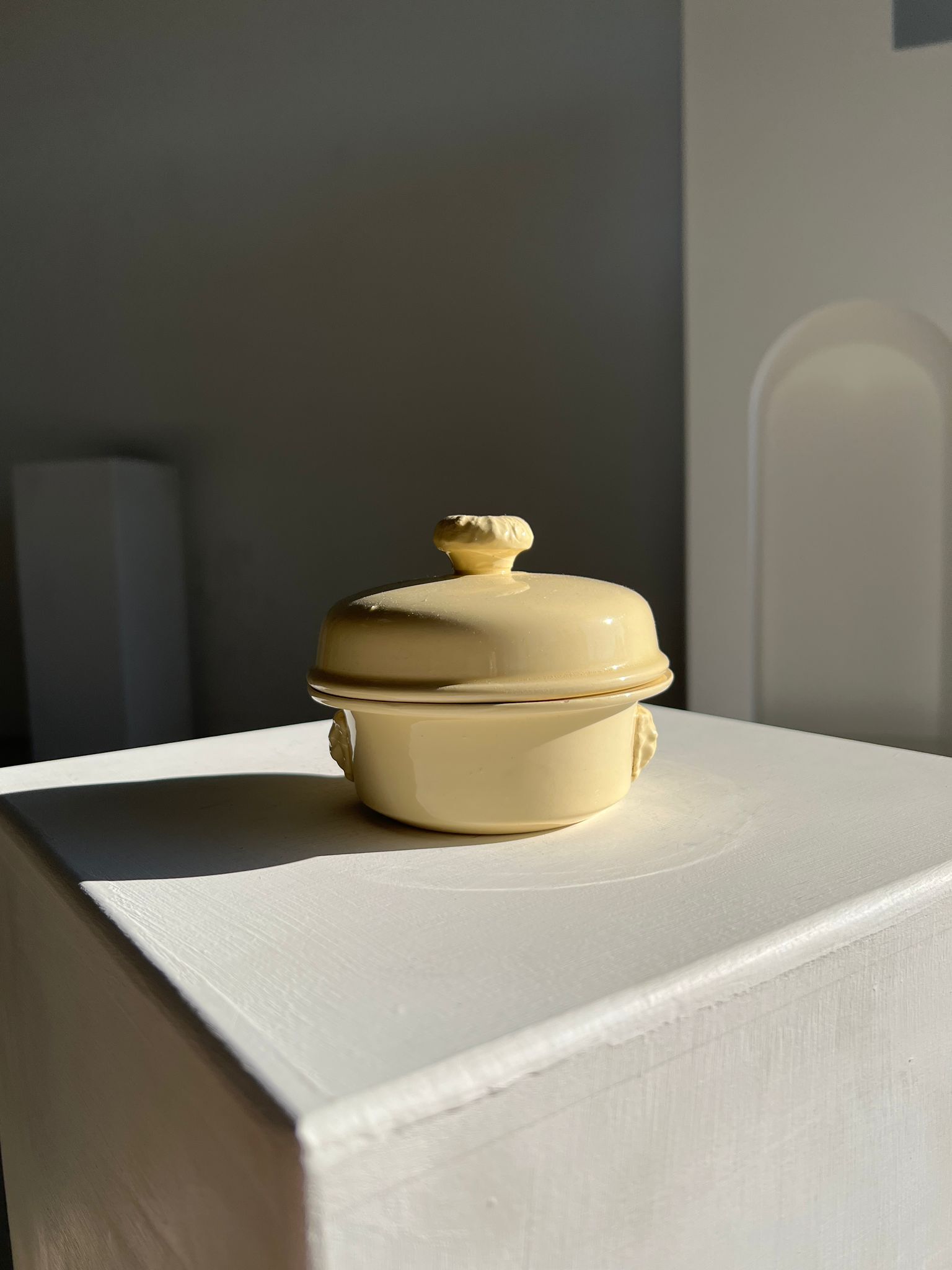 Glazed light yellow ceramic terrine