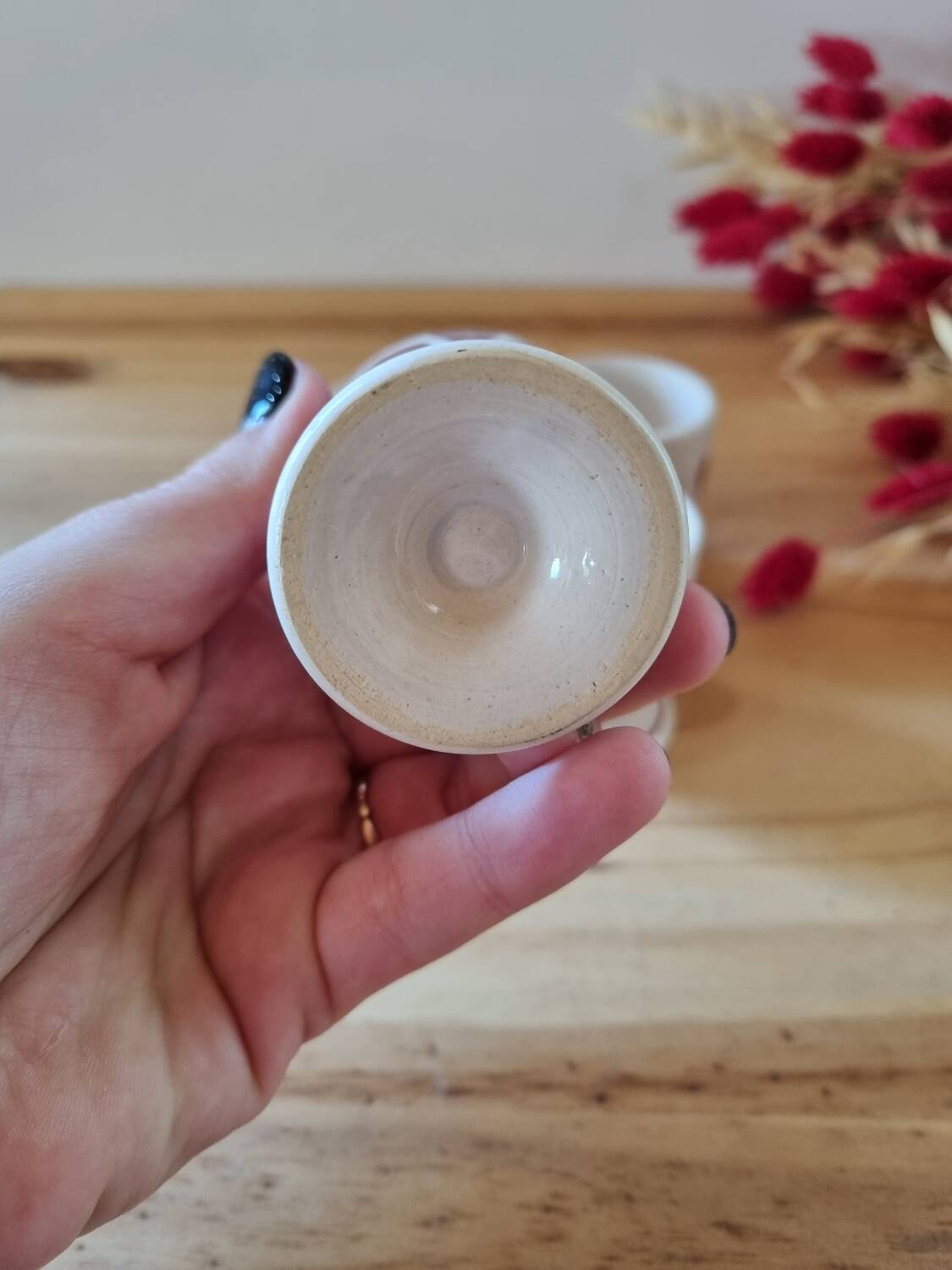 Set of four Digoin-style egg cups