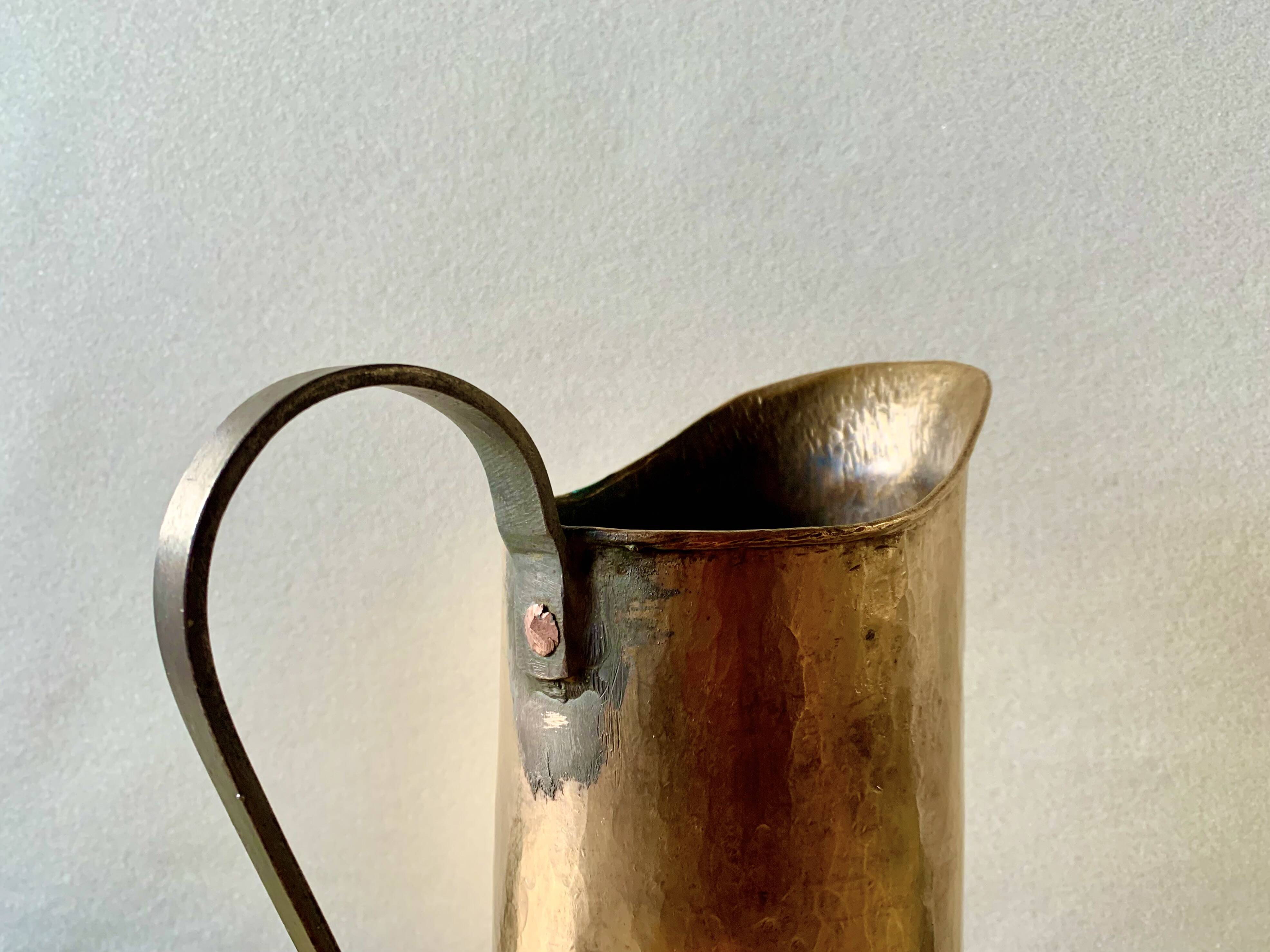 Old hammered copper water jug - artisanal work