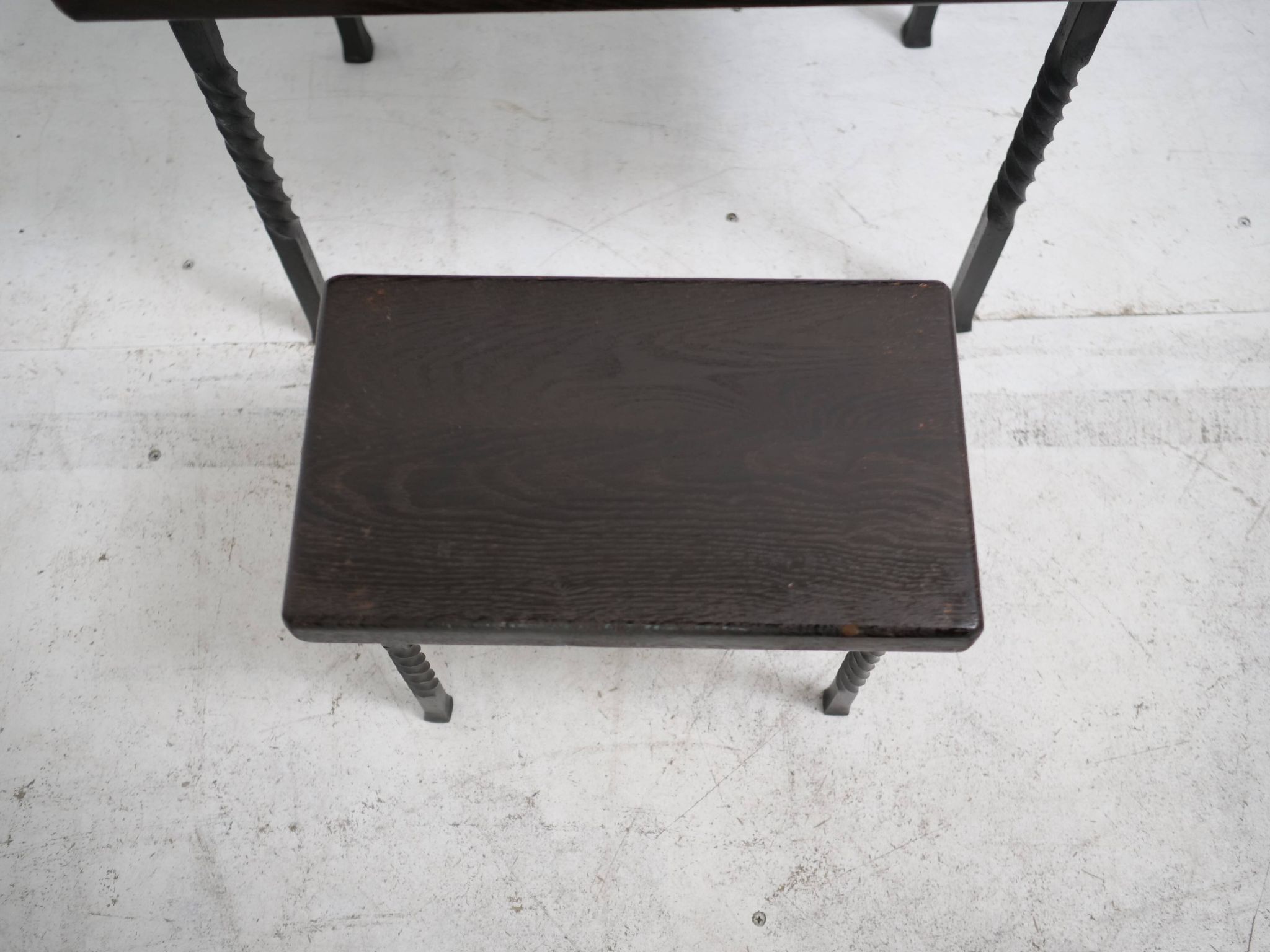 Brutalist nesting table in ebonized oak and wrought iron