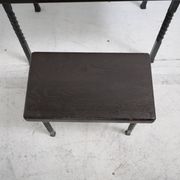 Brutalist nesting table in ebonized oak and wrought iron