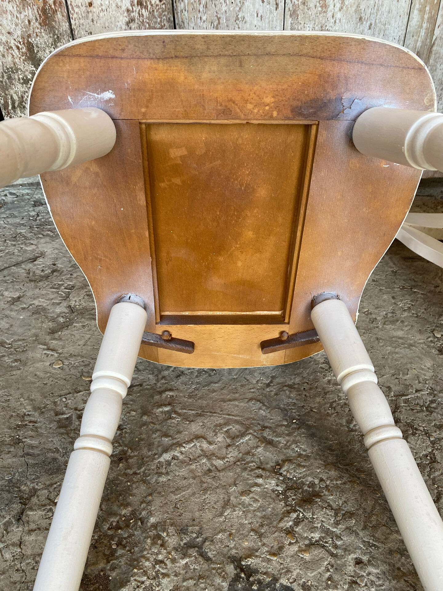 Pair of vintage white wooden bistro chairs