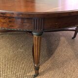 Important central pedestal table in mahogany, brass and bronze that can form a large dining table.