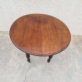 Round table with shutters with extension