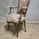 Vintage Louis XV style carved armchair with floral upholstery, 20th century, 90 × 58 cm