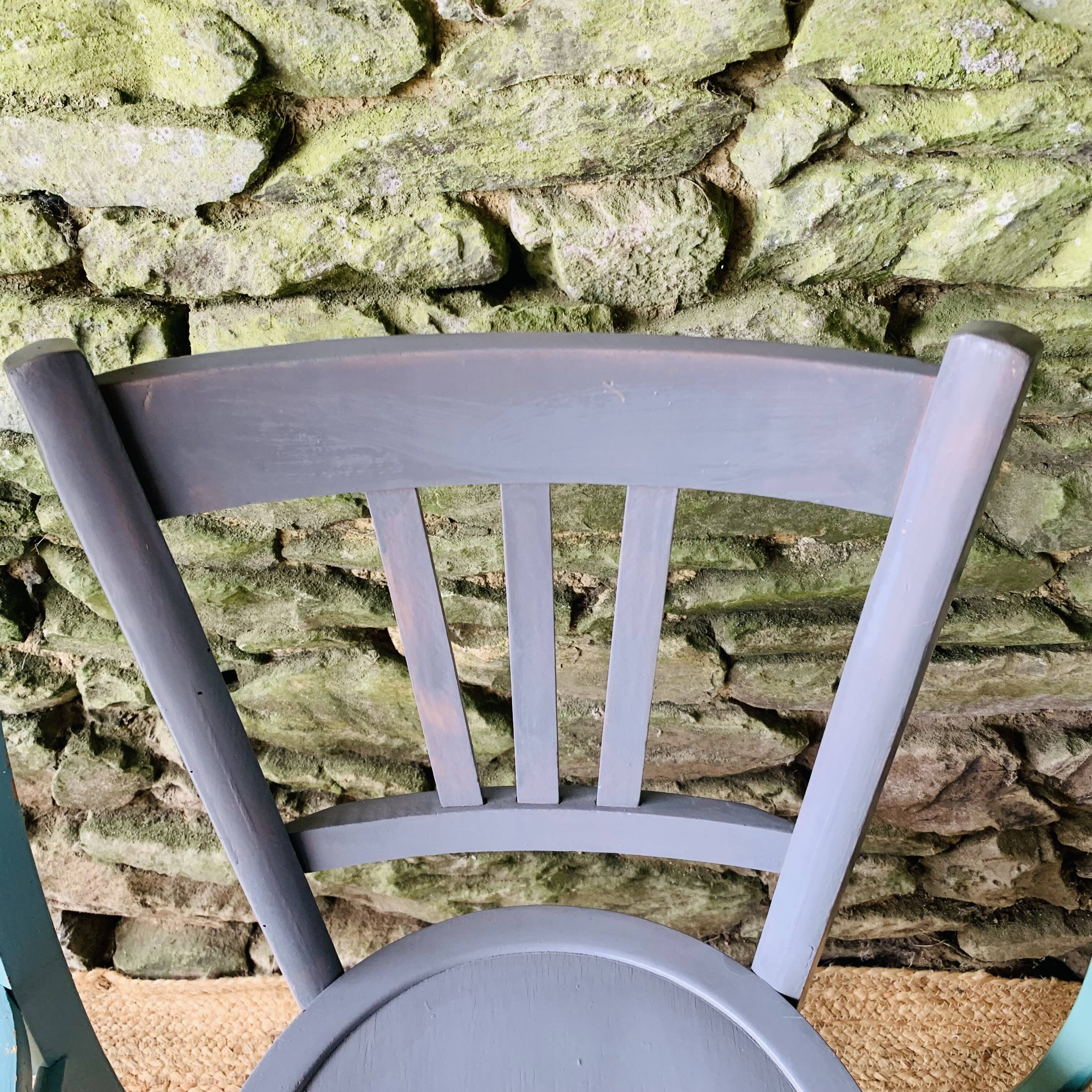 Set of four mismatched bistro chairs