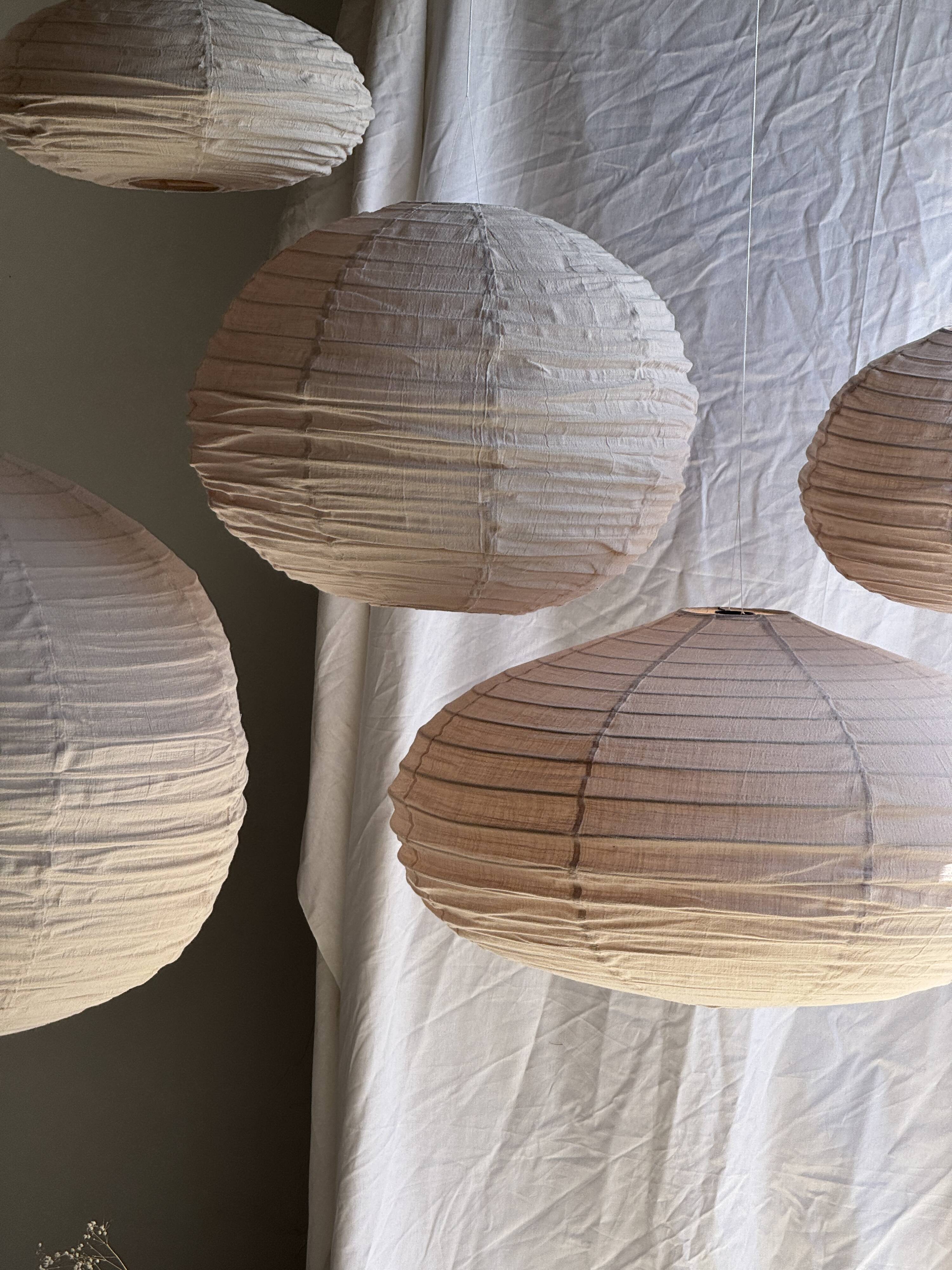 Large round pink Japanese-style suspension made of rattan and natural linen D60.
