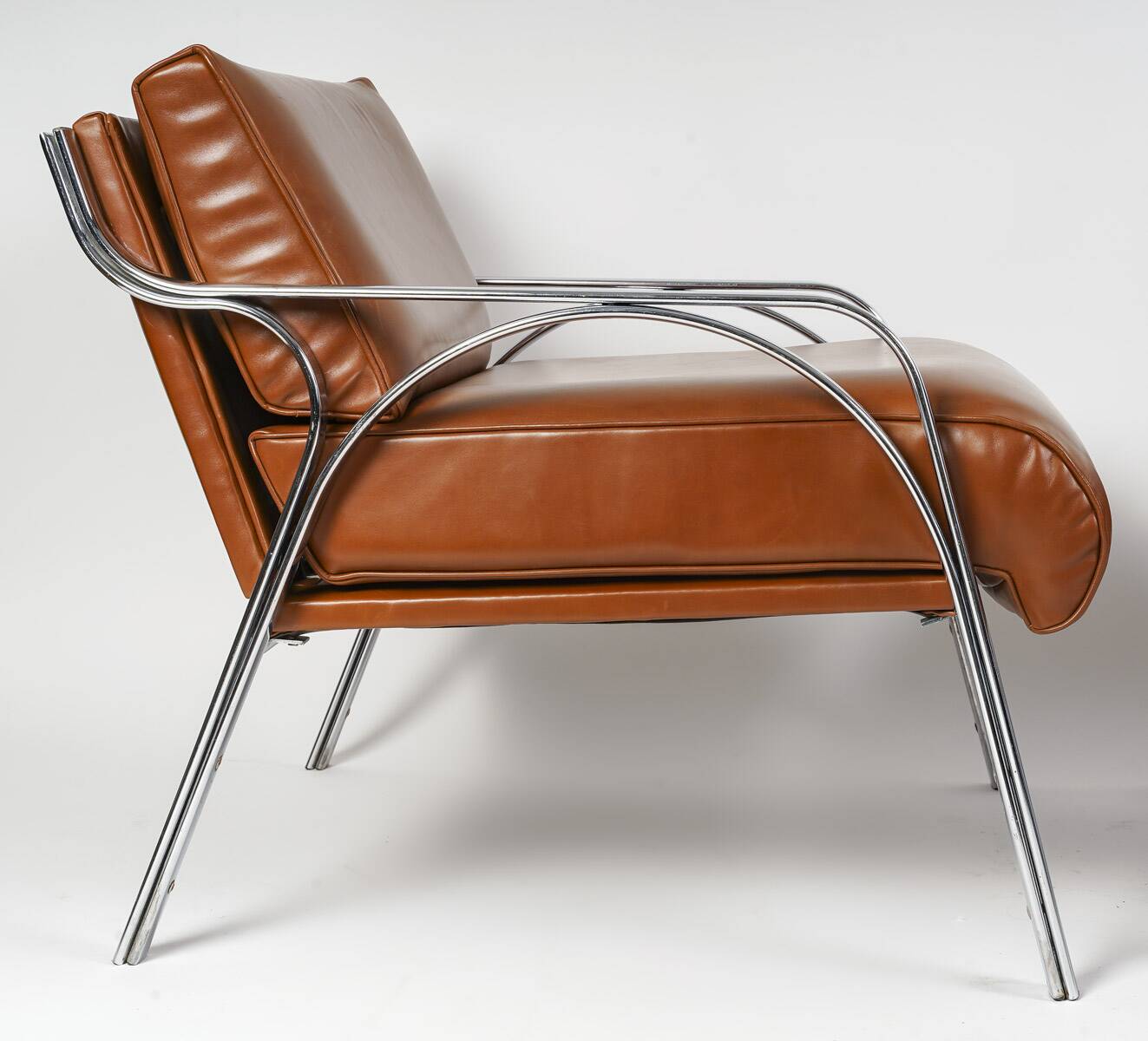 Pair of metal and leather armchairs from the 60s