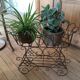 Antique iron plant stand