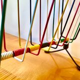 Multicolored vintage magazine racks