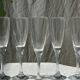 Set of 5 glass champagne flutes with twisted ribbed base